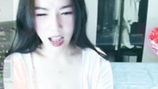 Asian anchor enjoying herself