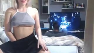 teen masturbates on cam with boyfriend in backround